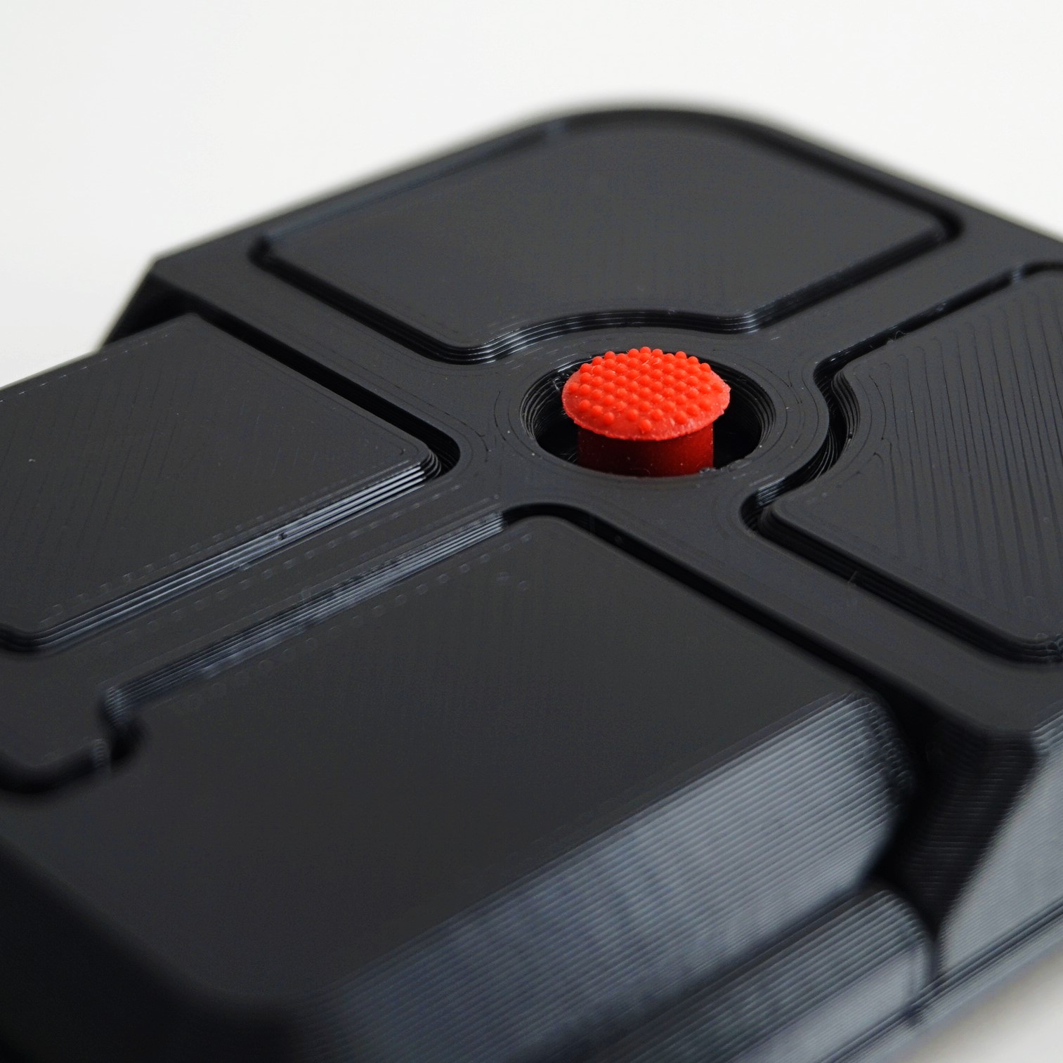 Official Ploopy product image showing the Bean pointing-stick device on a desk.